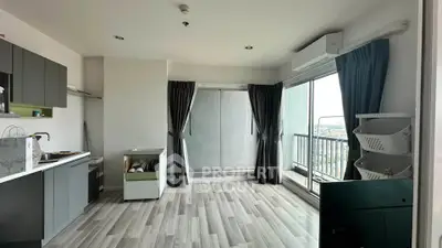 Modern open-layout kitchen with balcony view in a stylish apartment