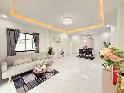 Spacious modern living room with elegant dining area and stylish decor