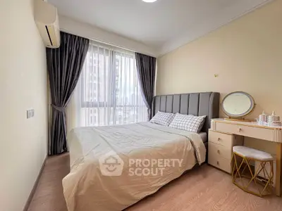 Modern bedroom with large window and stylish furniture in a high-rise apartment.