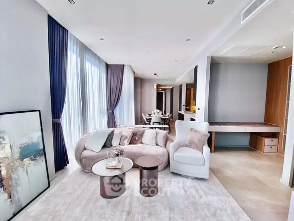 Luxurious modern living room with elegant decor and natural light