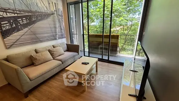 Modern living room with balcony view and stylish decor