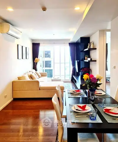 Spacious modern living room with elegant dining area and natural light