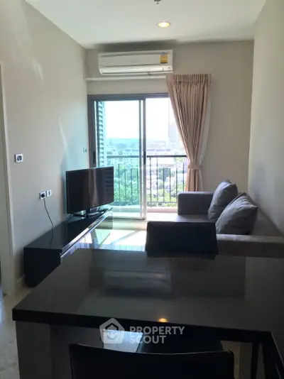 Modern living room with balcony view in a stylish apartment
