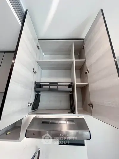 Modern kitchen cabinet with sleek design and built-in range hood