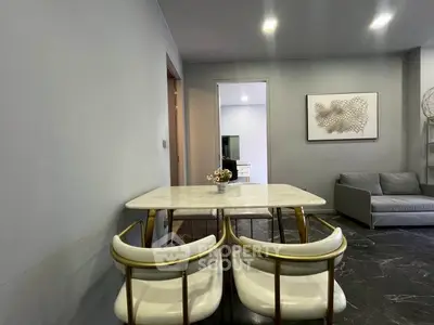 Modern living room with stylish dining area and contemporary decor