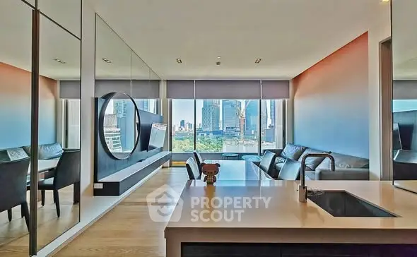 Modern living room with city view, sleek furniture, and open layout