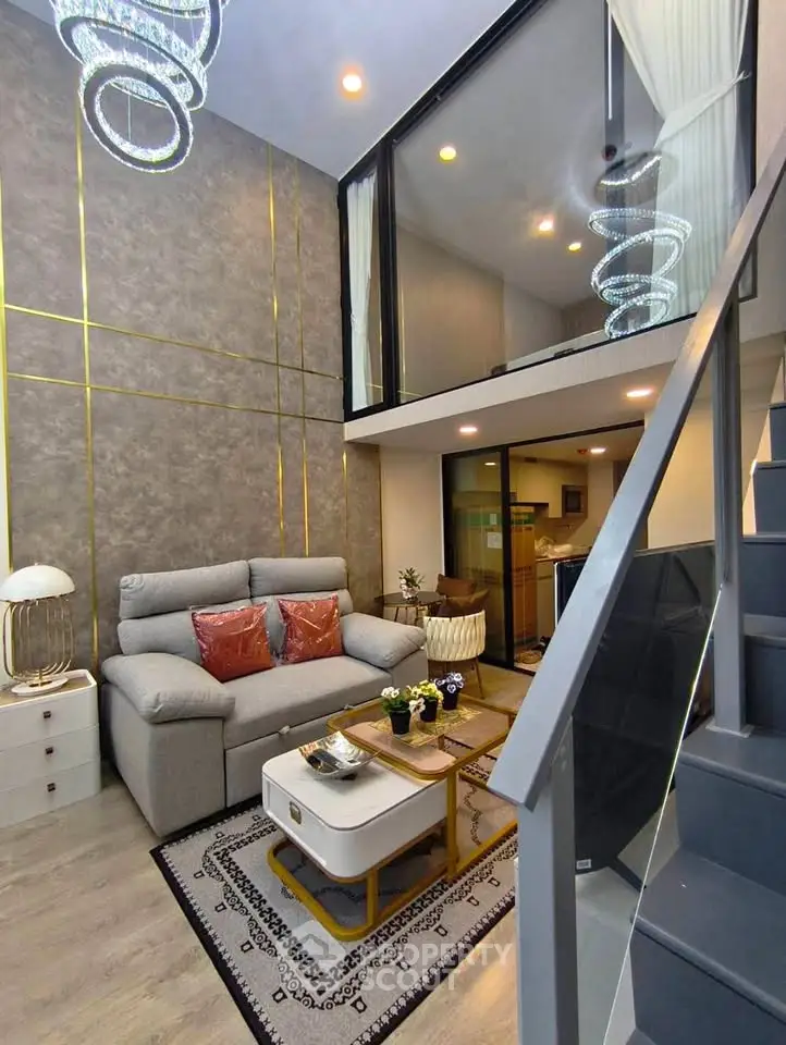 Modern duplex living room with stylish decor and elegant lighting