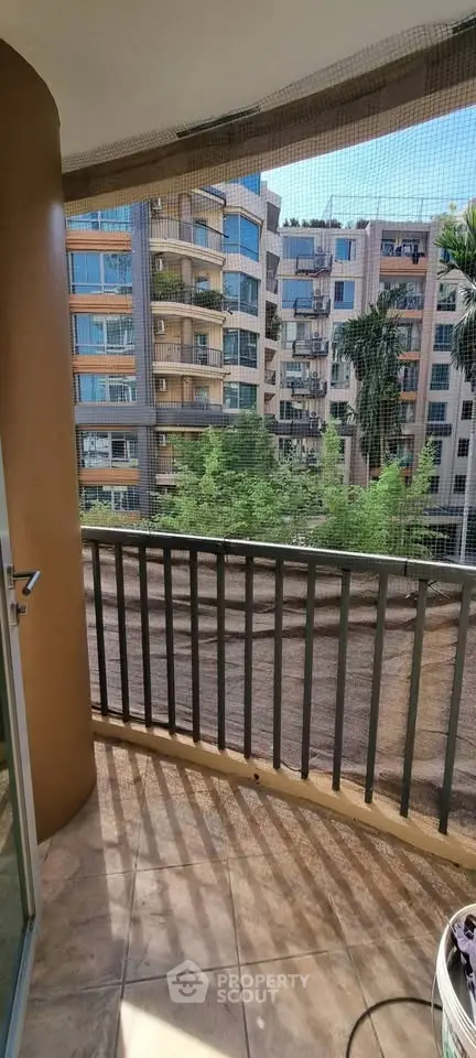 Charming balcony with city view in modern apartment complex