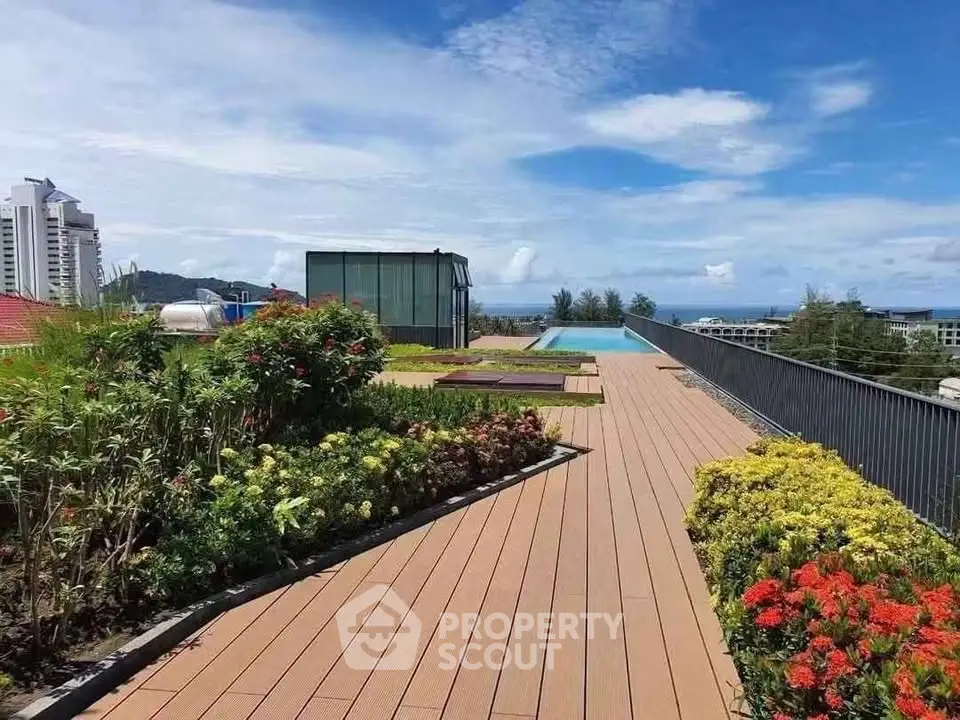 Stunning rooftop garden with pool and ocean view, perfect for luxury living.