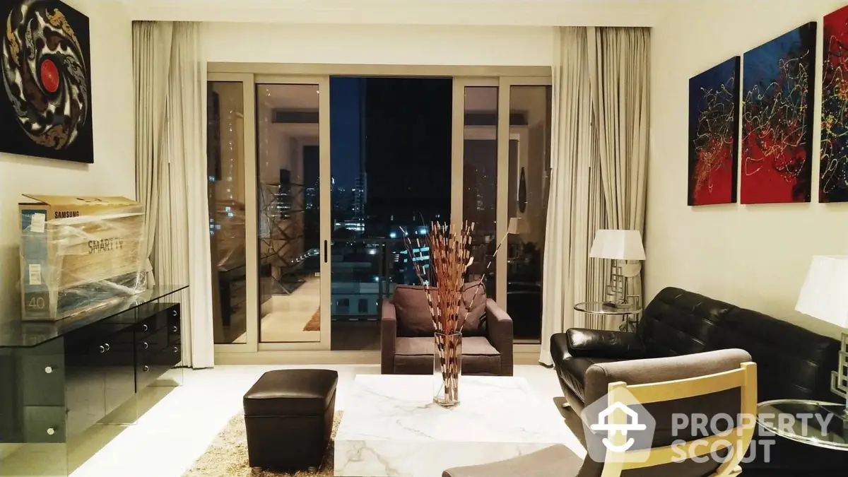 Elegant living room with modern furniture, floor-to-ceiling windows offering a city view, and tasteful art pieces enhancing the luxurious ambiance.