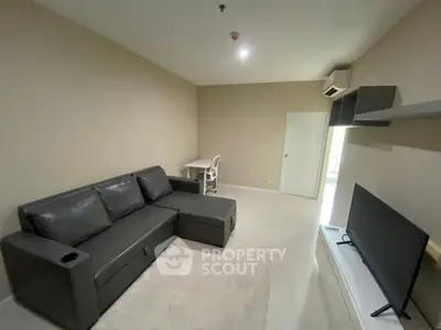 Modern living room with sleek furniture and neutral tones