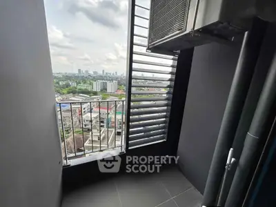 Modern balcony with city view and sleek design, perfect for urban living.