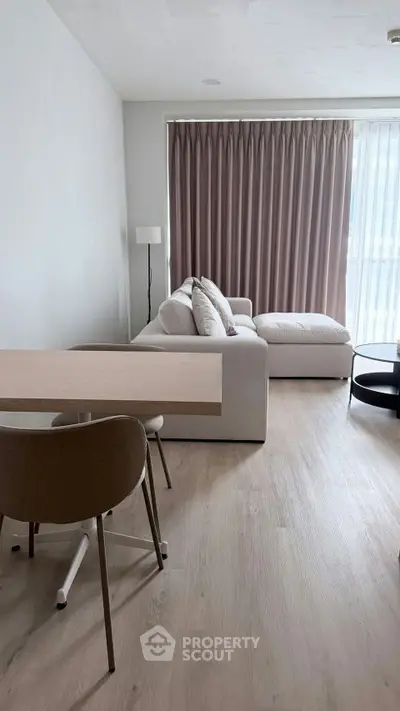 Modern living room with elegant decor and natural light