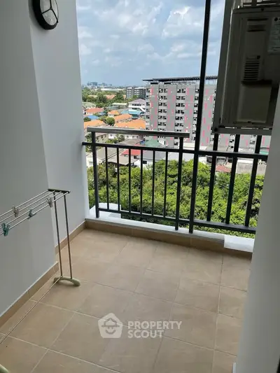 Charming balcony with scenic view in modern apartment, perfect for relaxation and enjoying the outdoors.