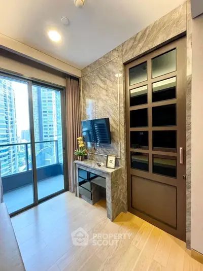 Modern living room with balcony view in luxury high-rise apartment