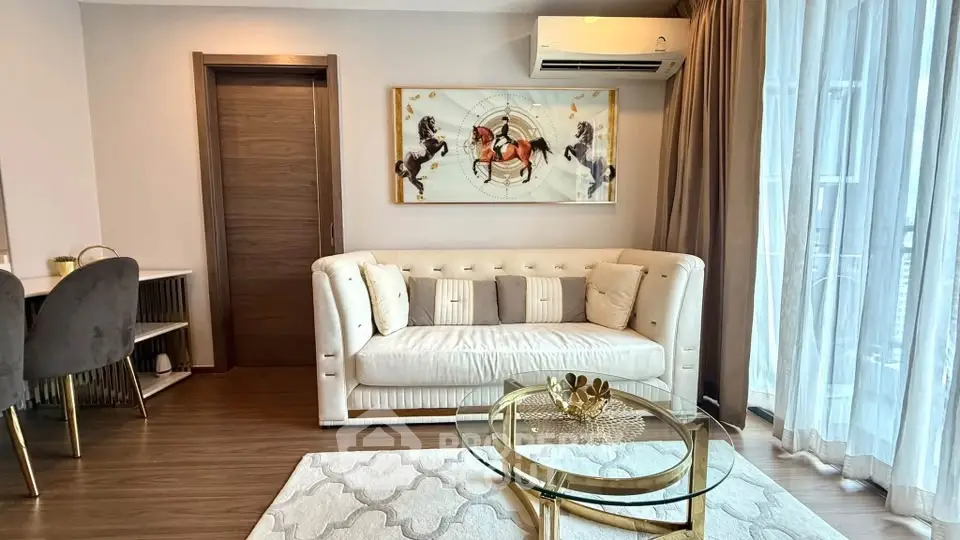 Luxurious living room with elegant decor and modern furniture in a stylish apartment.