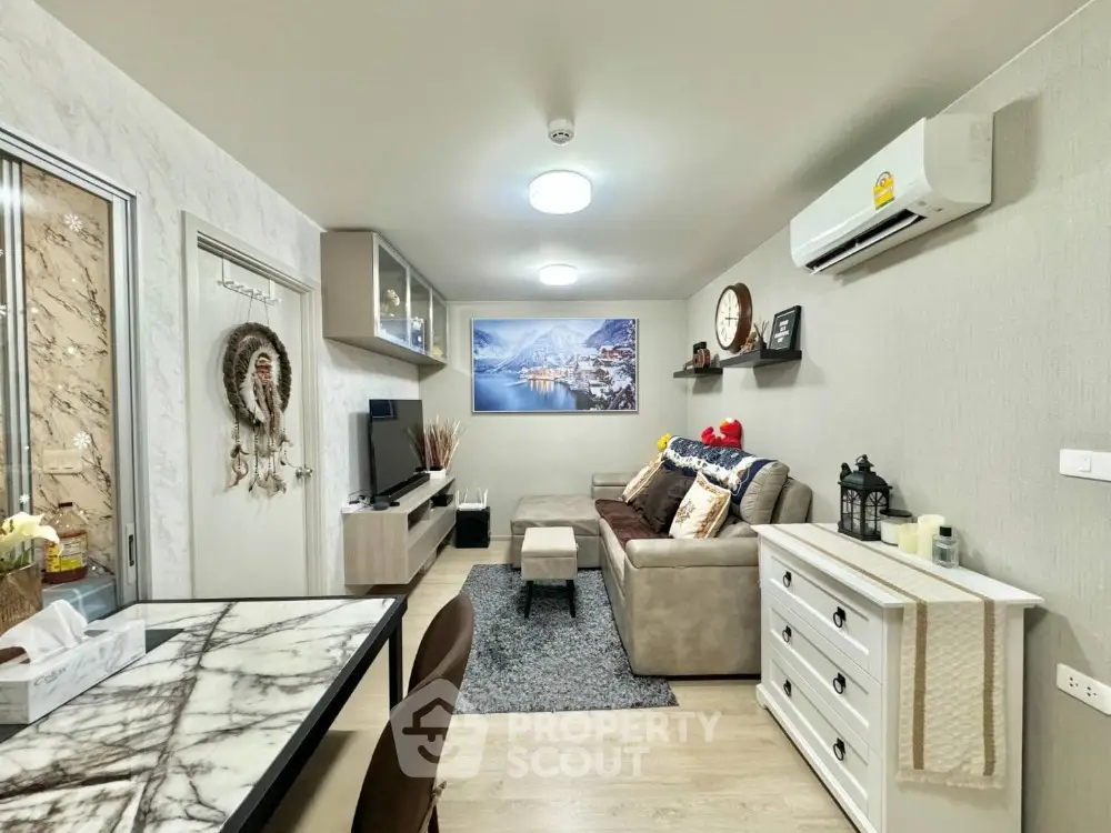 Modern living room with stylish decor and air conditioning