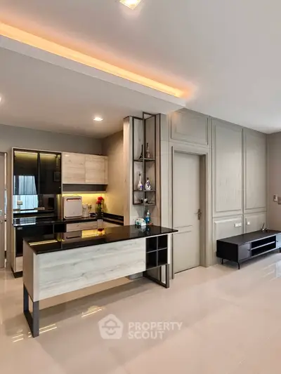 Modern kitchen with sleek design and open layout in a stylish apartment