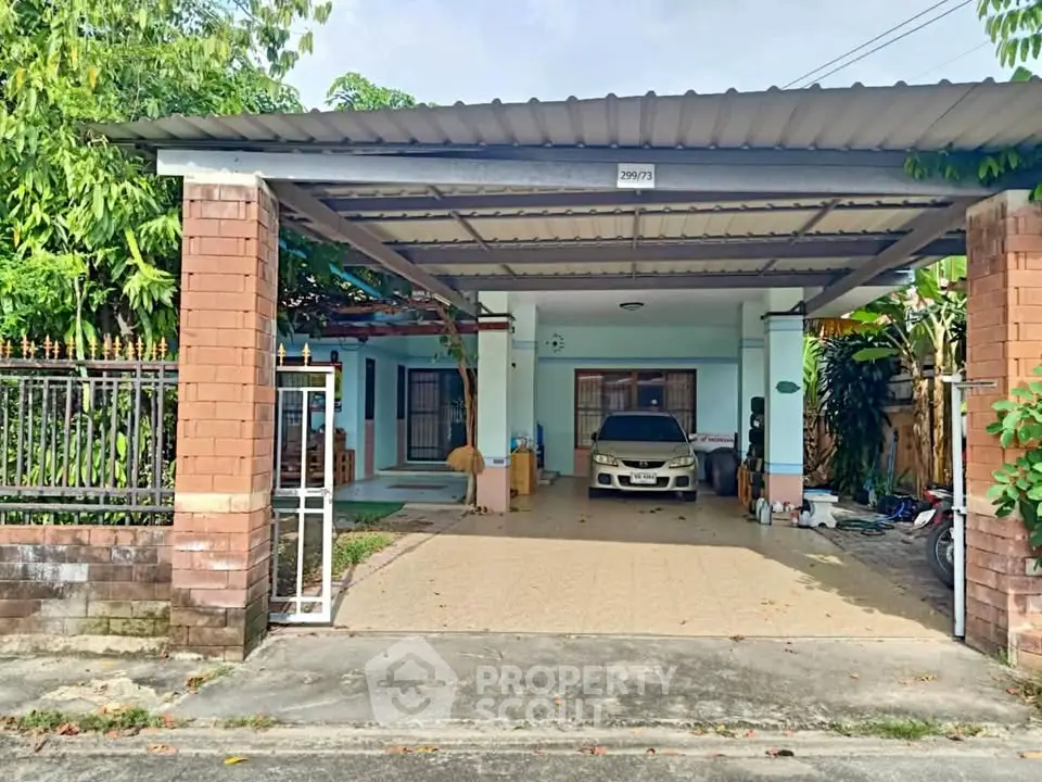 Charming single-story home with carport and lush greenery, perfect for family living.