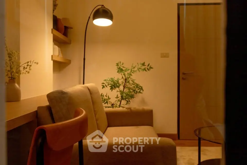 Cozy living room with modern decor and warm lighting
