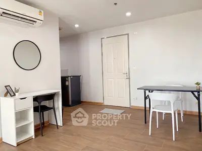 Modern apartment interior with stylish furniture and wooden flooring