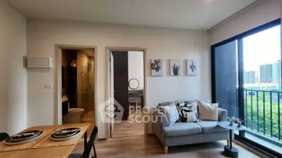 Modern living room with balcony view and stylish decor