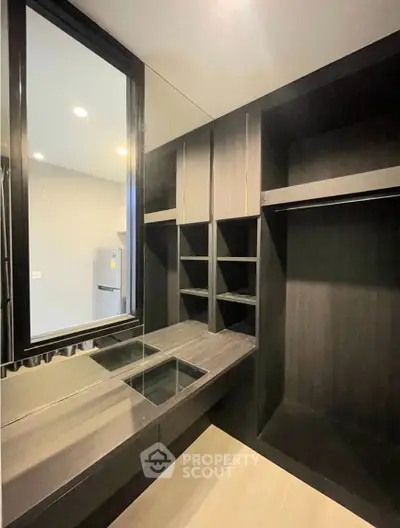 Modern kitchen with sleek cabinetry and open layout design