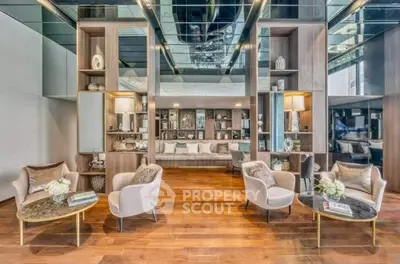 Luxurious modern living room with elegant decor and mirrored ceiling