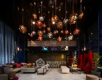 Luxurious modern living room with unique lighting and elegant decor