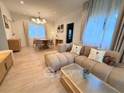Spacious modern living room with elegant decor and natural light