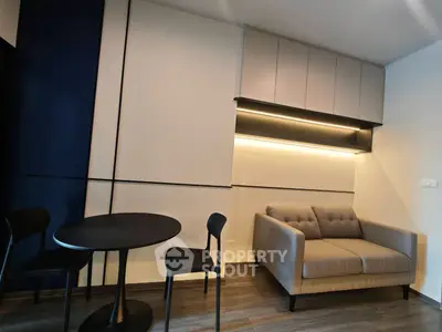 Modern living room with stylish furniture and ambient lighting