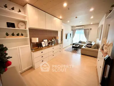 Spacious modern living room with elegant decor and ample natural light