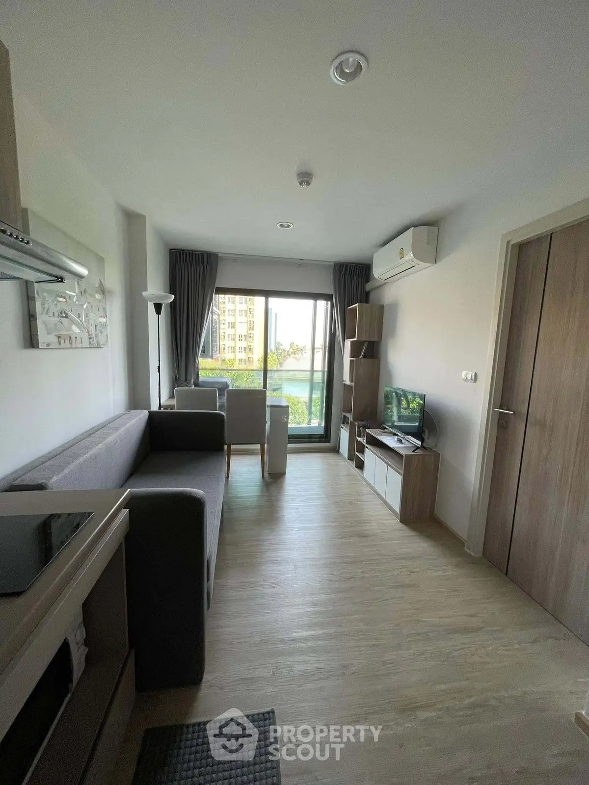 Modern living room with balcony view in a stylish apartment