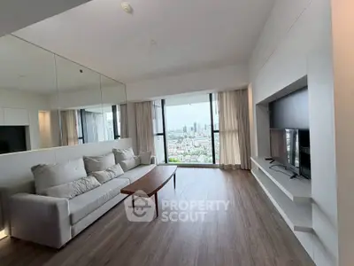 Spacious modern living room with panoramic city view and elegant decor