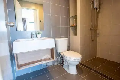 Modern bathroom with sleek design and spacious shower area