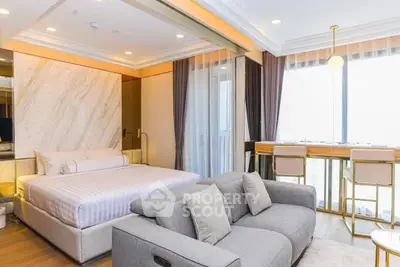 Luxurious modern bedroom with elegant decor and large windows offering stunning views.