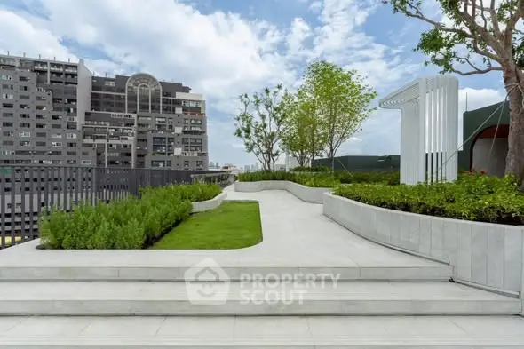 Modern rooftop garden with city view and stylish landscaping