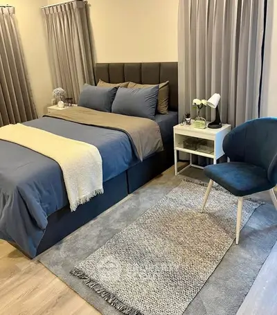 Cozy bedroom with stylish decor and modern furniture