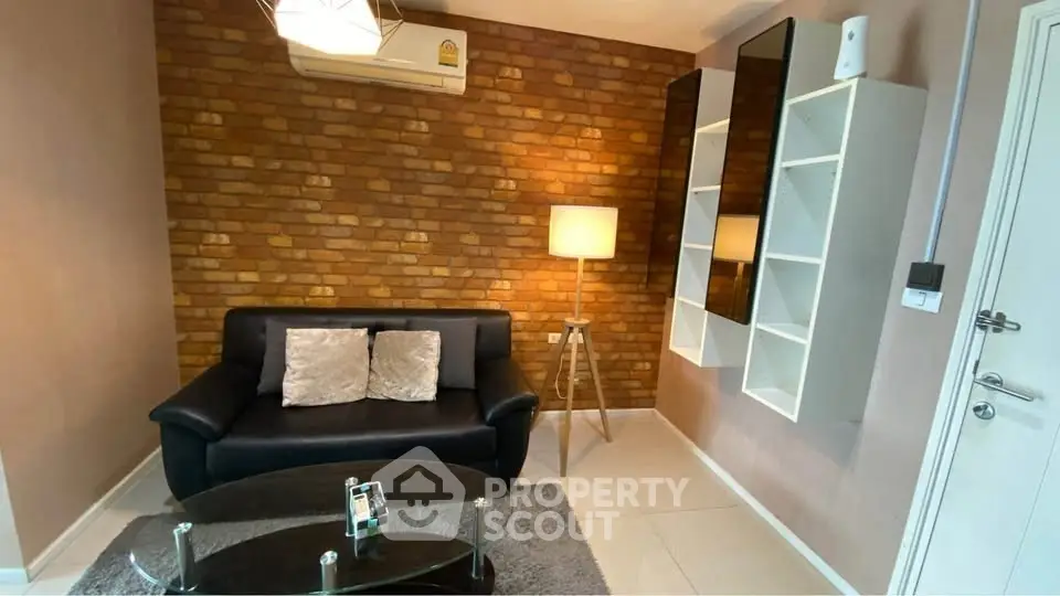 Chic living room with exposed brick wall and modern furniture