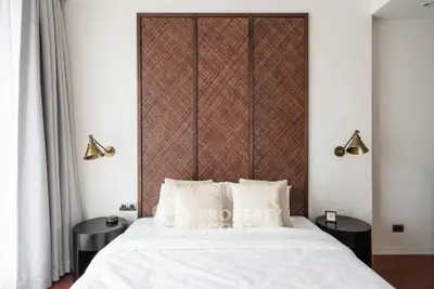 Luxurious bedroom with elegant decor and modern lighting fixtures