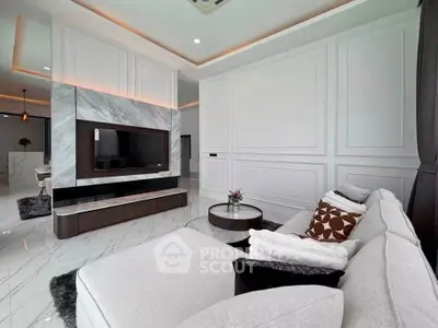 Luxurious modern living room with elegant marble accents and plush seating