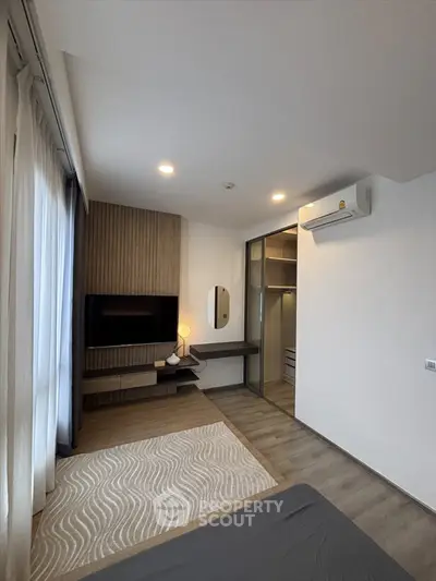 Modern bedroom with walk-in closet and stylish decor