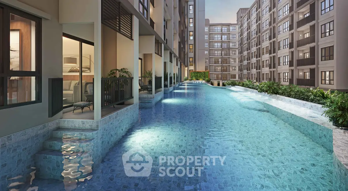 Luxurious apartment complex with stunning poolside view and modern architecture.