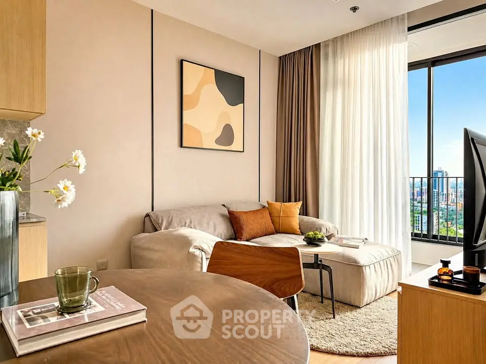 Modern living room with stylish decor and city view balcony, perfect for urban living.