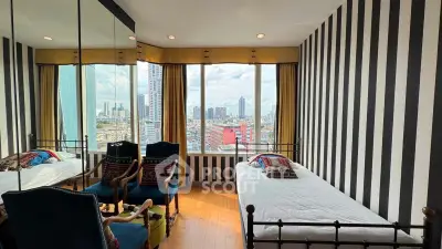 Stylish bedroom with panoramic city view and modern striped walls