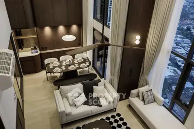 Luxurious high-ceiling living room with elegant decor and city view