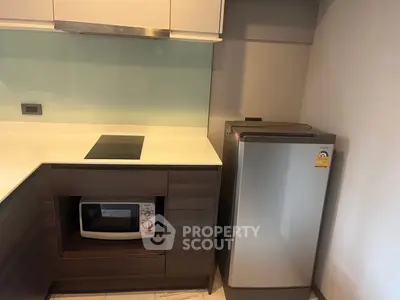 Modern kitchen with sleek appliances and minimalist design