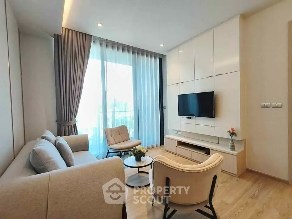 Modern living room with elegant furniture and natural light