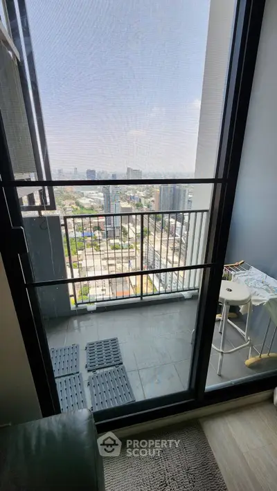 Modern balcony with city view, perfect for relaxation and enjoying the skyline.