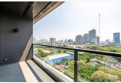 Stunning cityscape view from modern balcony in high-rise apartment